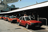 Red Hong Kong taxis